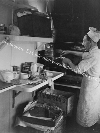 BUFFET CAR CHEF IN GALLEY KITCHEN